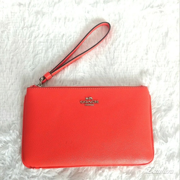 Coach Handbags - Coach large bright orange wristlet